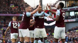 Aston Villa players celebrate after defeating Manchester City 2-1 at Villa Park on December 21, 2024."